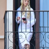 anya-taylor-joy-enjoys-a-cigarette-on-her-hotel-balcony-in-venice-09-04-2021-3