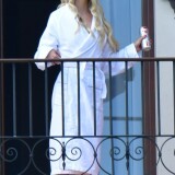 anya-taylor-joy-enjoys-a-cigarette-on-her-hotel-balcony-in-venice-09-04-2021-6