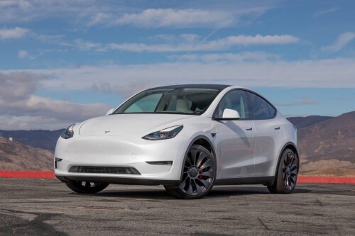 tesla-model-y-2022-06-exterior-front-angle-sedan-white-scaled.jpg
